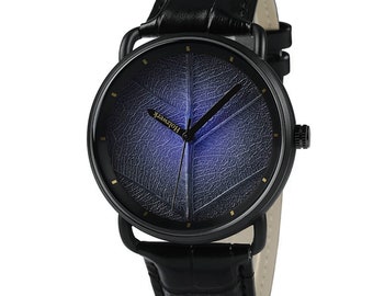 Holzwerk BIRKENAU Reloj de pulsera para mujer y hombre de piel y acero inoxidable con esfera en forma de hoja, moderno reloj de mujer, reloj de hombre, negro, morado, azul