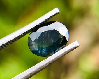 Natural Teal Australian Sapphire Gemstone: 0.60 Ct Oval Faceted Loose Gem