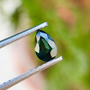 Natural Australian Sapphire Gemstone: Pear Faceted Bi-Color Green Gem (0.50 ct)