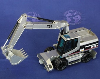 Caterpillar M318 excavator (GOLD) Limited Edition in 1:50 scale diecast by NZG