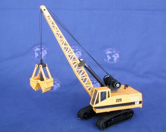 Caterpillar 225 Clamshell nowy kolor - Joal skala 1:50 odlew ciśnieniowy
