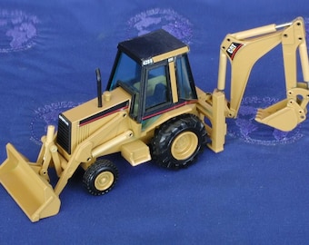 Caterpillar 428 B backhoe loader in1:50 scale diecast by NZG