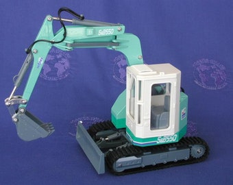 Hanix Super graaf-minigraafmachine, schaal 1:26, gegoten door Diapet