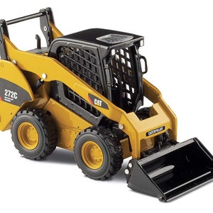 Norscot Caterpillar 272C skid steer + 2 attachments 1:32 scale diecast