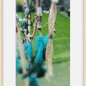 Atrapasueños plumas y metal