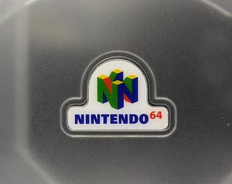 Dreamcast 64 System Jewel – Nintendo 64 Parody Badge – Retro Console Crossover Mod – Solid or Clear Acrylic