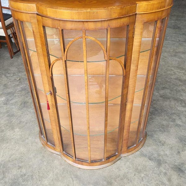 20thC bow front glazed China cabinet bookcase shelves