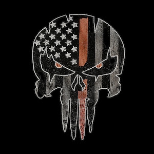 May include: A black and white skull with a red and white American flag design and a thin red line down the center. The skull is made of rhinestones.