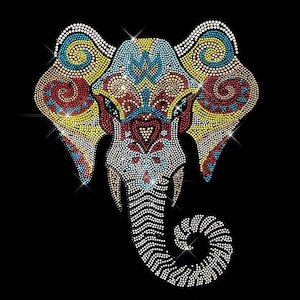 May include: A colourful rhinestone elephant design with a detailed pattern on the ears and trunk. The elephant is made of small, sparkling rhinestones in shades of blue, red, yellow, and white.