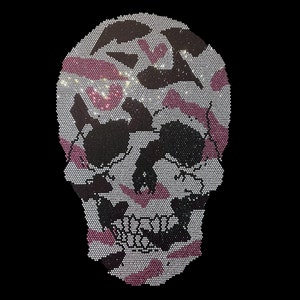 May include: A skull design made of rhinestones in a pink and white camouflage pattern.
