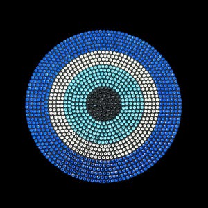 May include: A blue and white evil eye charm with a black center, made of rhinestones. The charm is round and has a concentric circle design.