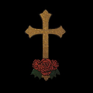 May include: A gold cross with a red rose design at the base. The cross and rose are made of rhinestones.