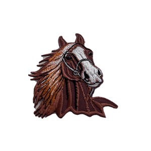 Peut inclure: Patch brodé représentant la tête d'un cheval brun avec une étoile blanche sur le front.