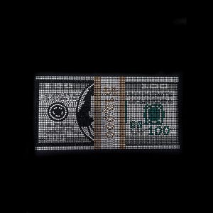 May include: A close-up of a $100 bill made of rhinestones. The bill is black and white with a green $100 in the corner.