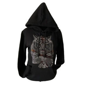May include: Black hooded sweatshirt with a white tiger design on the front. The tiger is made of rhinestones.
