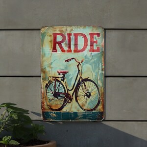 a rusted metal sign with a bicycle on it