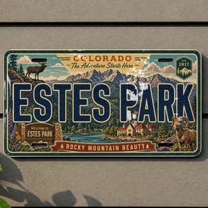 May include: A rectangular metal sign featuring a vintage-style illustration of Estes Park, Colorado. The design includes a mountain landscape, a lake, an elk, a bighorn sheep, and the text "Colorado The Adventure Starts Here" and "Estes Park".
