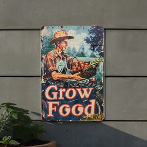 a sign on the side of a building that says grow food