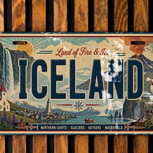 May include: A rectangular metal sign featuring the word ICELAND in large blue letters. The illustration depicts a waterfall, a church, a volcano, and a puffin. Text reads Land of Fire & Ice and NORTHERN LIGHTS GLACIERS GEYSERS WATERFALLS.