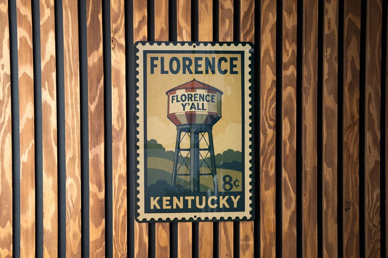 A vintage-style metal sign with the text "FLORENCE" and "FLORENCE Y'ALL" is displayed on a wooden wall.