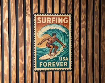 May include: Vintage-style metal sign featuring a surfer riding a wave. The sign reads "SURFING USA FOREVER" in a stamp-like design with a retro color palette of orange, teal, and beige. The sign is mounted on a wooden slatted wall.