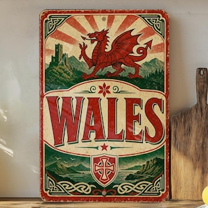 May include: A vintage-style metal sign featuring a red dragon, a castle, and the word "WALES" in bold letters. The sign has a distressed look with a red, green, and cream color scheme, and decorative Celtic knot borders. The sign is rectangular.