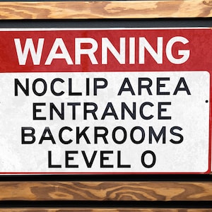 May include: A red and white warning sign with the text "WARNING NOCLIP AREA ENTRANCE BACKROOMS LEVEL 0".