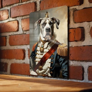 May include: A Great Dane dog wearing a military uniform with a gold sash and a crown on its head. The dog is looking directly at the viewer with a serious expression.