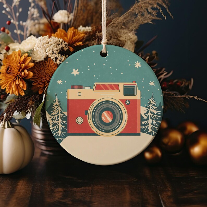 a christmas ornament with a camera on it