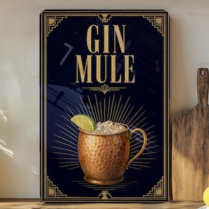 May include: A rectangular wall art print with a dark blue background and gold text that reads "GIN MULE". The image features a copper mug with ice and a lime wedge. The print has a decorative gold border.