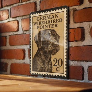 May include: A rectangular metal sign featuring a detailed illustration of a German Wirehaired Pointer dog. The sign has a vintage postage stamp design with the text "GERMAN WIREHAIRED POINTER" and "20 C" in a serif font. The background is tan.