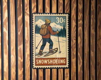 Panneau en métal « Raquettes à neige » – oeuvre d'art murale de style tampon vintage sports d'hiver, décoration de cabane rustique, cadeau d'aventure en plein air