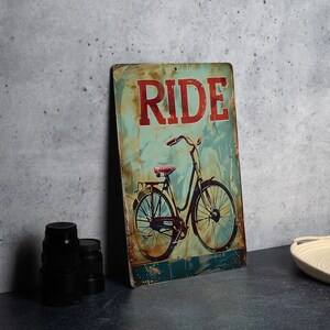 a sign that says ride with a bicycle on it