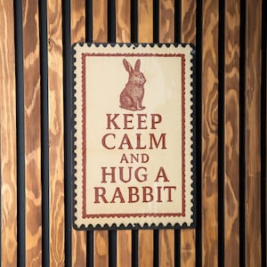 Keep Calm and Hug a Rabbit Metal Sign – Vintage Stamp Style Wall Art, Bunny Lover Gift, Farmhouse Rabbit Decor