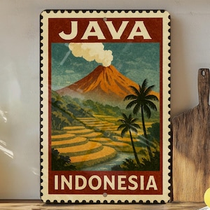 May include: Vintage-style metal sign featuring a landscape of Java, Indonesia. The sign has a stamp-like design with the words "JAVA" and "INDONESIA" in bold letters. The image depicts a volcano, terraced fields, and palm trees.