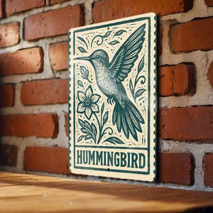 Hummingbird Stamp Style Metal Sign – Vintage-Inspired Wall Art for Home, Garden, or Patio Décor