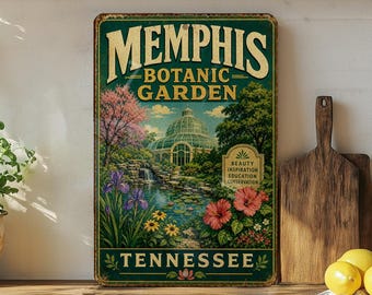 May include: Vintage metal sign for the Memphis Botanic Garden in Tennessee. The sign features a colourful illustration of the garden with a greenhouse, waterfall, and various flowers. The sign is green, gold, and brown.