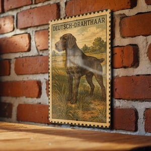 May include: A vintage-style metal sign featuring a Deutsch-Drahthaar dog standing in a field. The sign has a postage stamp design with the breed name at the top. The sign is brown, tan, and green.