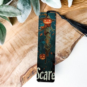 a bookmark with a picture of a scare on it
