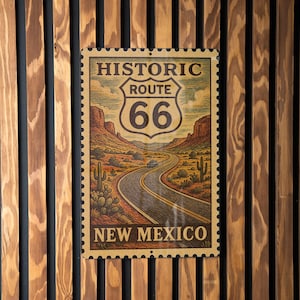 A vintage-style poster of the historic Route 66 in New Mexico, featuring a winding road and desert landscape.