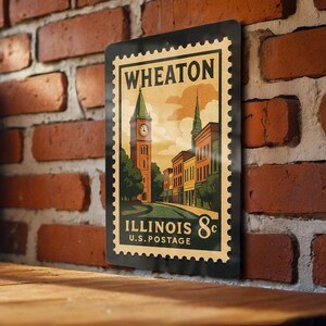 May include: A vintage-style metal sign featuring a stylized illustration of Wheaton, Illinois, with a clock tower and street scene. The sign is designed to resemble a postage stamp, with the text "WHEATON" at the top and "ILLINOIS U.S. POSTAGE 8¢" at the bottom.