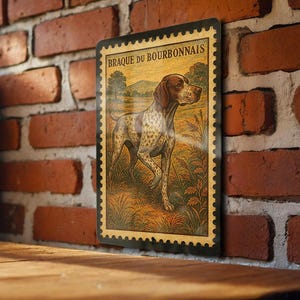 May include: A rectangular metal sign featuring a vintage illustration of a Braque du Bourbonnais dog in a field. The dog is brown and white, with a landscape background. The sign has a decorative border and the text "BRAQUE DU BOURBONNAIS".