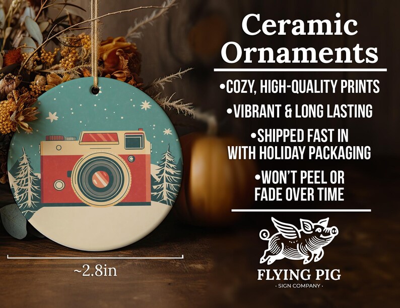a ceramic ornament with a camera on it