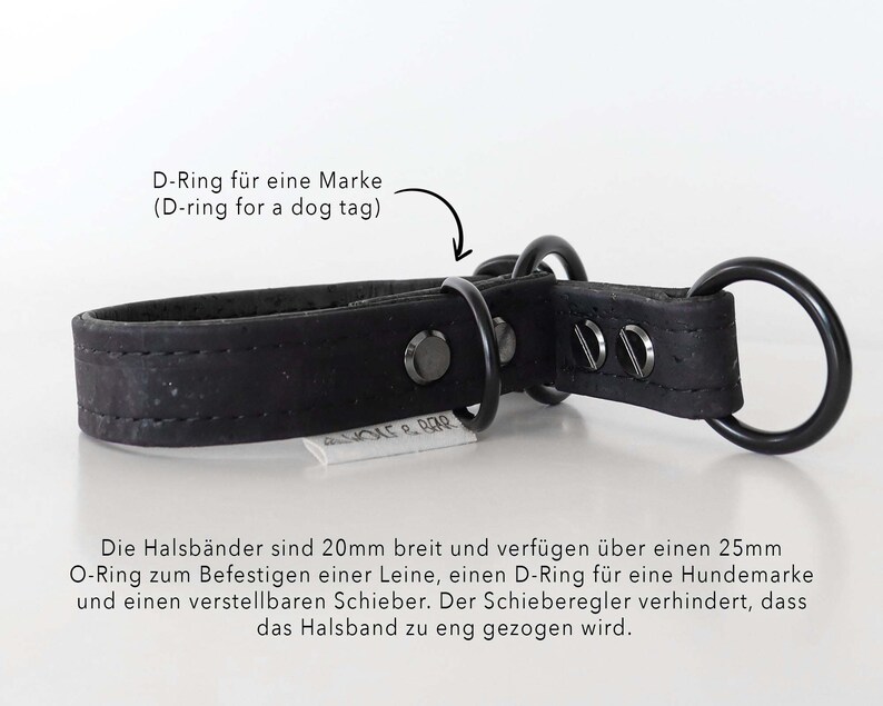 May include: A black dog collar with a D-ring for a dog tag and a large O-ring. The collar is made of a textured material and has metal hardware. The text on the collar says "D-Ring for a dog tag".