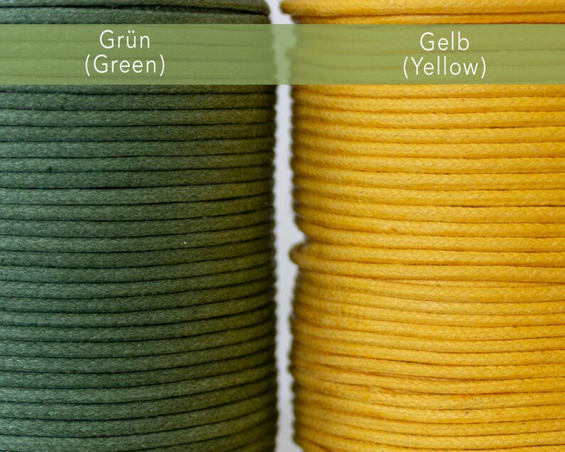May include: Close-up of two spools of cord, one in a deep green and the other in a bright yellow. The text "Gr&uuml;n (Green)" and "Gelb (Yellow)" is visible above each spool. The cord is tightly wound, showcasing its texture and color.