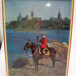 Vintage Blue Bird Confectioners Tin with Canadian Mountie / Ottawa Canada