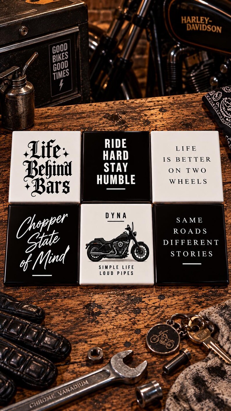 May include: A set of six square coasters featuring black and white designs with motorcycle-themed text and graphics, including phrases like Life Behind Bars, Ride Hard Stay Humble, Life Is Better On Two Wheels, Chopper State of Mind, and Dyna.