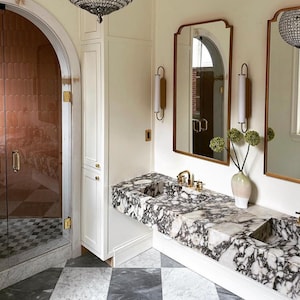 Lavabo da appoggio in marmo Calacatta Viola: lavabo su misura per bagno di servizio.