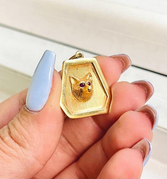 Ruby eyes sun pendant - Gem