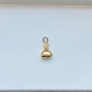 Ciondolo vintage a forma di sacco porta soldi in oro giallo 14k